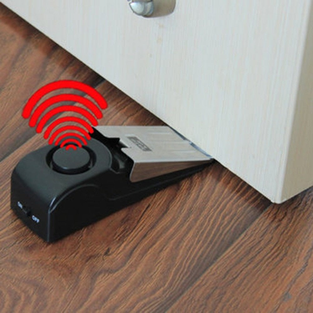 Tope de seguridad para puerta con alarma